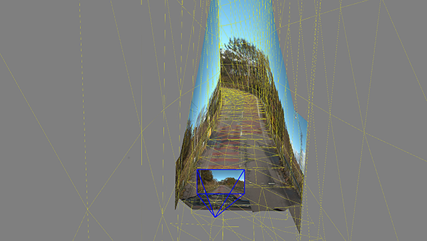 図 2「Real Video Drive Player」によって自動生成された仮想スクリーンに実写映像を投影した結果